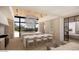 Modern kitchen boasting double islands, white marble countertops, ample seating, and stylish light fixtures above island at 4729 E Arcadia Ln, Phoenix, AZ 85018