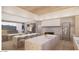 Elegant kitchen with double island, marble countertops, custom cabinetry, and an inviting design for entertaining at 4729 E Arcadia Ln, Phoenix, AZ 85018
