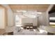 Bright living room with modern lighting, stone fireplace, and comfortable white seating at 4729 E Arcadia Ln, Phoenix, AZ 85018