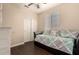 Guest bedroom with daybed, sliding closet doors, and wood floors at 4834 E Robin Ln, Phoenix, AZ 85054