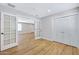 Bedroom features french doors, new flooring and closet space at 5371 S Country Club Way, Tempe, AZ 85283