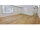Bright room with modern flooring and a large window at 5371 S Country Club Way, Tempe, AZ 85283