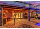 Charming backyard patio with built-in outdoor kitchen and a cozy seating area, ideal for relaxing and entertaining at 5443 W Hobby Horse Dr, Phoenix, AZ 85083