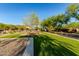 This community park offers green space with shade trees, play equipment and walking paths at 5443 W Hobby Horse Dr, Phoenix, AZ 85083