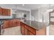 Kitchen featuring a large island and stainless steel appliances at 5443 W Hobby Horse Dr, Phoenix, AZ 85083