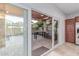 View from the kitchen to a covered outdoor patio with grill and seating at 5443 W Hobby Horse Dr, Phoenix, AZ 85083