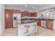 Kitchen featuring stainless steel appliances, tile backsplash and granite counters at 5443 W Hobby Horse Dr, Phoenix, AZ 85083