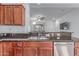 Granite counters, stainless steel appliances and fixtures in the kitchen at 5443 W Hobby Horse Dr, Phoenix, AZ 85083