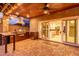 Well-equipped outdoor kitchen featuring a built-in grill and refrigerator, perfect for alfresco dining and entertaining at 5443 W Hobby Horse Dr, Phoenix, AZ 85083