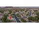 Aerial view highlighting a lovely home nestled in a vibrant residential community with mature trees at 6172 W Kerry Ln, Glendale, AZ 85308