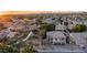 A stunning aerial perspective reveals the property's location, manicured grounds, and inviting pool and spa at 6172 W Kerry Ln, Glendale, AZ 85308