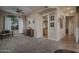 Bright living room with carpeted flooring, archways and neutral color palette at 6172 W Kerry Ln, Glendale, AZ 85308