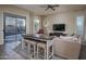 Cozy living room with access to the backyard and pool area at 6172 W Kerry Ln, Glendale, AZ 85308