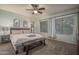 Serene main bedroom featuring large windows and soft, neutral tones at 6172 W Kerry Ln, Glendale, AZ 85308