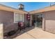Covered patio area with furniture, siding glass doors, and nice light at 6936 W Monterey Way, Phoenix, AZ 85033