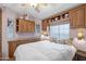 Bedroom featuring a bed, built in shelves, and natural light at 7750 E Broadway Rd # 538, Mesa, AZ 85208