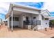 Charming manufactured home featuring well-kept landscaping, covered parking, and a welcoming front porch at 7750 E Broadway Rd # 538, Mesa, AZ 85208