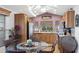 A spacious kitchen featuring wood cabinetry, modern appliances, and an adjoining dining area for easy entertaining at 7750 E Broadway Rd # 538, Mesa, AZ 85208