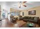 A cozy living room featuring comfortable sofas and recliners, providing a relaxing space at 7750 E Broadway Rd # 538, Mesa, AZ 85208