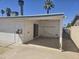 Covered patio in backyard with storage on back of house at 7821 W Clarendon Ave, Phoenix, AZ 85033