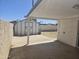 Covered patio with access to a storage shed in the backyard at 7821 W Clarendon Ave, Phoenix, AZ 85033
