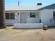 Attractive one-story house featuring white brick exterior and desert landscaping at 7821 W Clarendon Ave, Phoenix, AZ 85033
