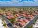 Lovely aerial view of a residential community with charming homes, lush landscaping, and well-maintained streets at 7911 E San Miguel Ave # 3, Scottsdale, AZ 85250