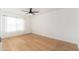 Bright and airy bedroom with hardwood floors and large windows at 7911 E San Miguel Ave # 3, Scottsdale, AZ 85250