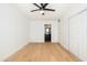 Light-filled bedroom with hardwood floors and access to a stylish en-suite bathroom at 7911 E San Miguel Ave # 3, Scottsdale, AZ 85250