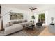 Bright living room features stylish decor, hardwood floors, and sliding glass doors at 7911 E San Miguel Ave # 3, Scottsdale, AZ 85250