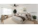 Inviting bedroom with a king-sized bed, soft carpet, and ample natural light at 7911 E San Miguel Ave # 3, Scottsdale, AZ 85250