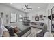Inviting bedroom with desk, neutral color palette, comfortable bed, and plenty of natural light at 8520 E Cactus Wren Rd, Scottsdale, AZ 85250