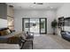 Spacious main bedroom with sliding glass doors opening to a lush backyard and patio area at 8520 E Cactus Wren Rd, Scottsdale, AZ 85250