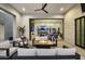 Comfortable outdoor seating area with a modern fireplace, seamlessly blending indoor and outdoor living spaces at 8520 E Cactus Wren Rd, Scottsdale, AZ 85250