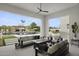 Outdoor patio offers a fire pit, comfortable seating, and views of the pool and backyard at 8520 E Cactus Wren Rd, Scottsdale, AZ 85250
