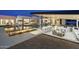 Beautiful pool area with bar, fire feature and several seating locations for entertaining or relaxation at 8520 E Cactus Wren Rd, Scottsdale, AZ 85250