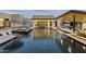 Modern pool area with clean lines, a built-in spa, and an outdoor lounge, creating a luxurious and relaxing retreat at 8520 E Cactus Wren Rd, Scottsdale, AZ 85250