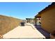 Spacious backyard featuring a barbecue grill and lush pool area with a charming waterfall at 10628 W Country Club Trl, Peoria, AZ 85383
