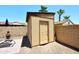 Backyard storage shed offering convenient space for organizing tools and outdoor equipment at 10628 W Country Club Trl, Peoria, AZ 85383