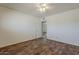 Inviting bedroom boasts wood floors and natural light at 10655 E Broadway Rd, Mesa, AZ 85208