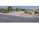 Well-kept front yard with desert landscaping, offering a welcoming approach to the house at 10655 E Broadway Rd, Mesa, AZ 85208
