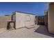 Exterior view of a shed with ample space and storage, and a gate that offers entry at 10655 E Broadway Rd, Mesa, AZ 85208