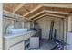 Interior view of a shed featuring built-in storage shelves, and wooden construction at 10655 E Broadway Rd, Mesa, AZ 85208
