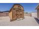 Exterior view of the shed with an ample space to be converted into a workshop or storage area at 10655 E Broadway Rd, Mesa, AZ 85208