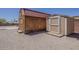 Exterior shot of two sheds with ample space that can be used as a workshop or for storage at 10655 E Broadway Rd, Mesa, AZ 85208
