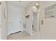 Bright entryway with neutral decor, tile flooring, and a view into the home's interior at 1141 W Stephanie Ln, San Tan Valley, AZ 85143