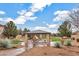 Community park featuring a covered picnic pavilion with tables and playground in the background at 1141 W Stephanie Ln, San Tan Valley, AZ 85143