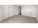 Bedroom features new carpet, closet with sliding doors and access to other rooms at 11640 N 51St Ave # 211, Glendale, AZ 85304