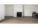 Bright living room with modern flooring and cozy fireplace at 11640 N 51St Ave # 211, Glendale, AZ 85304