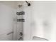 Shower features a rainfall shower head, built-in niche, and convenient grab bar at 11640 N 51St Ave # 211, Glendale, AZ 85304